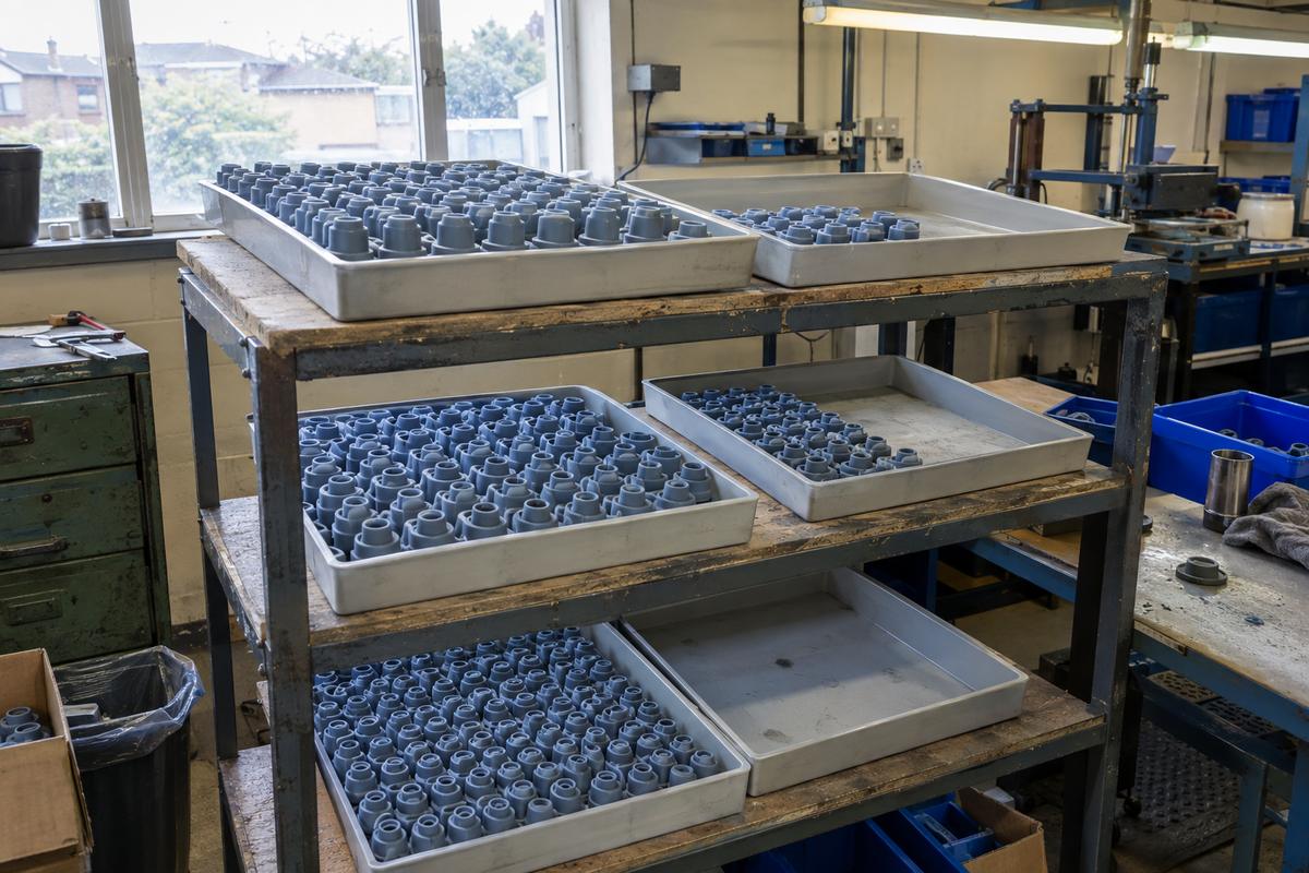 Trays of identical moulded parts at different stock levels
