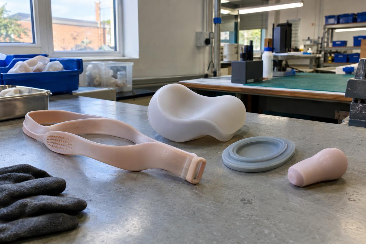 Soft silicone wearable and patient-contact parts arranged on a bench