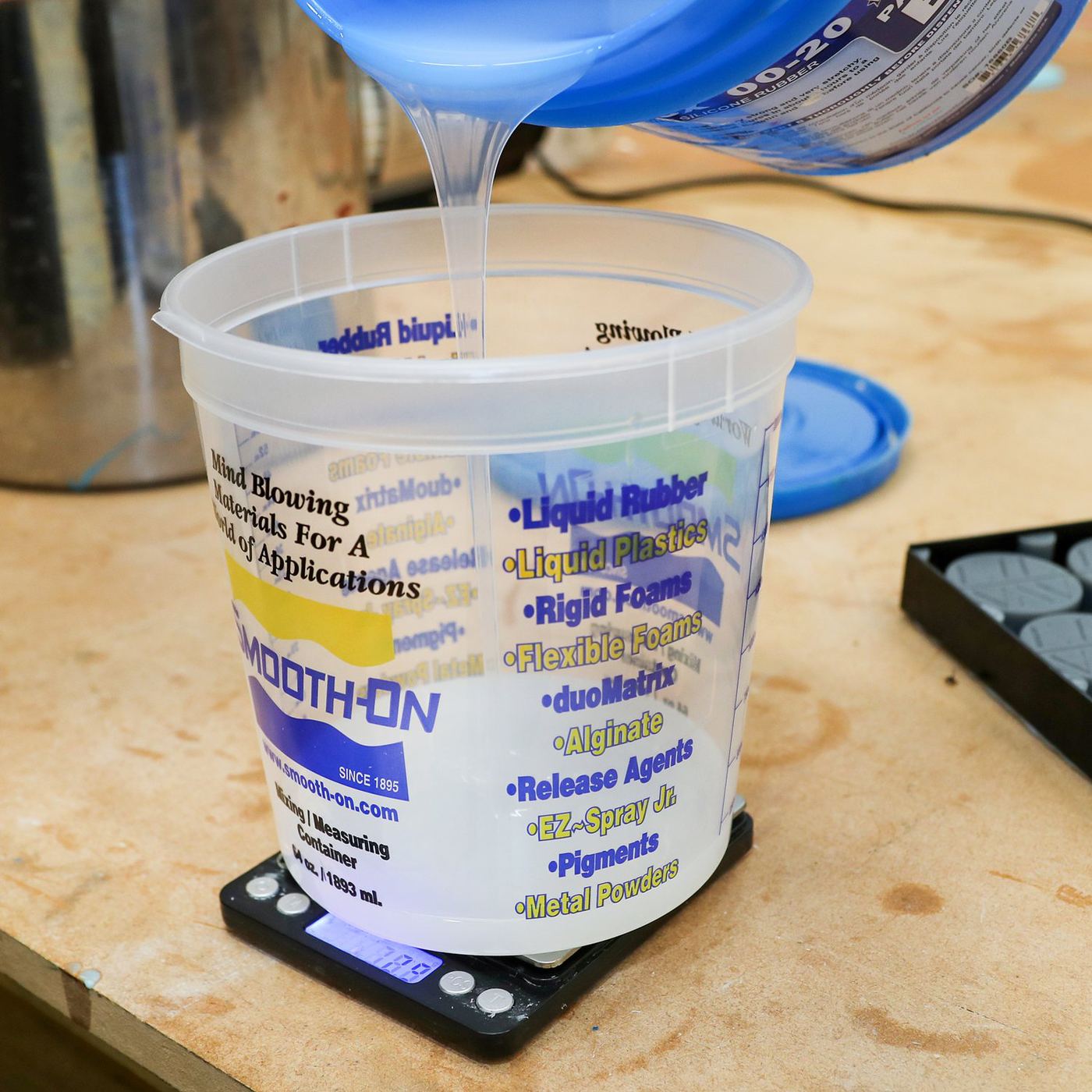 Weighing a two-part silicone before mixing.