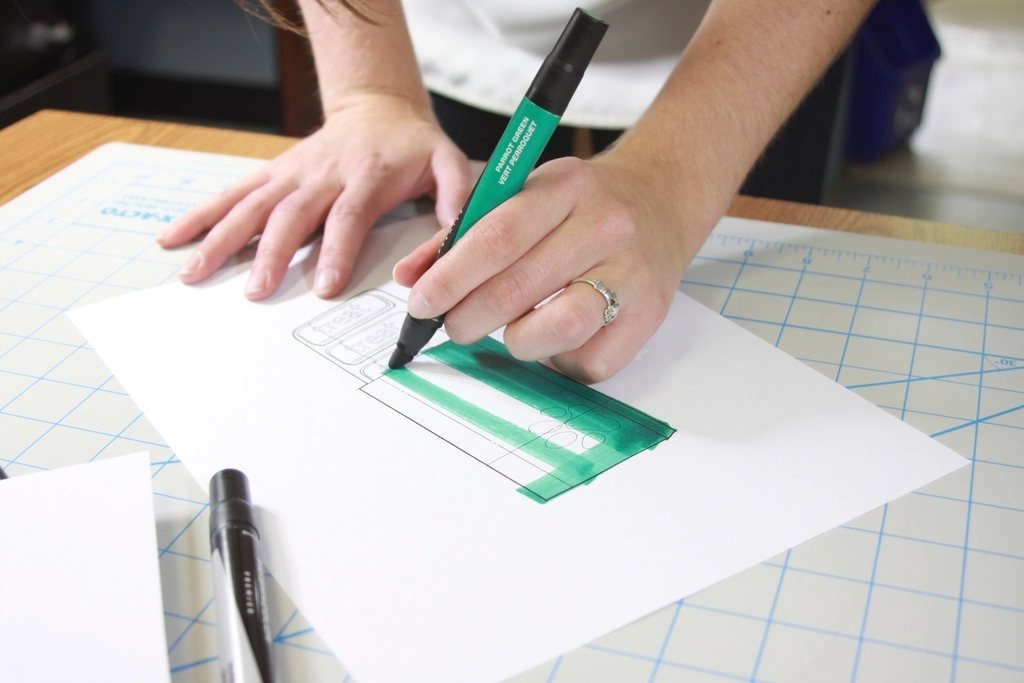 Designer drawing a packaging layout