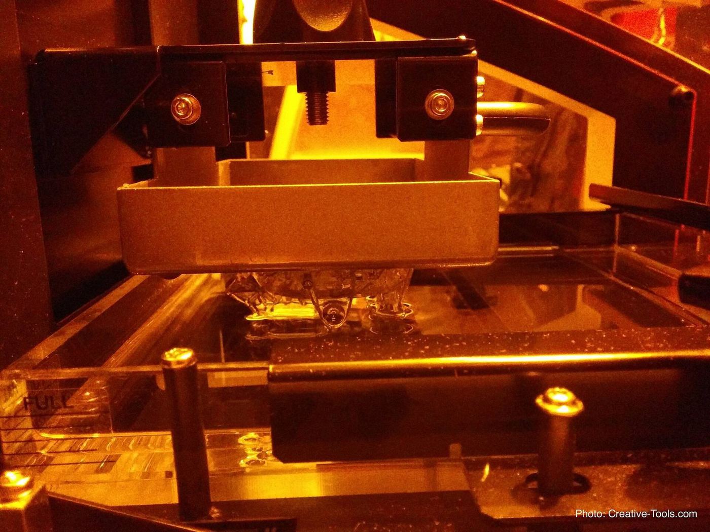 Inside an SLA printer: build platform over the resin tank.